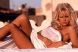 
	Pamela Anderson vrea meniu vegetarian la Bucuresti! Cel mai ieftin bilet la petrecerea Playboy Mansion - 1.100 euro!
