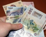 Cati bani economisesc romanii din venituri