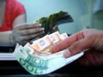 Romanii au trimis, in primele patru luni ale anului, de doua ori mai putini bani ca in 2008