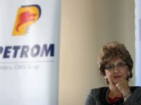
	Cea mai mare companie din Romania a facut 1,7 mld. lei in prima jumatate a anului. Profitul Petrom a urcat cu 14%

