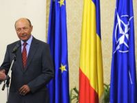
	Basescu nu renunta la ideea adoptarii euro in 2015
