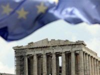 
	Autoritatile de la Atena dau asigurari ca Grecia va evita falimentul si va ramane in zona euro
