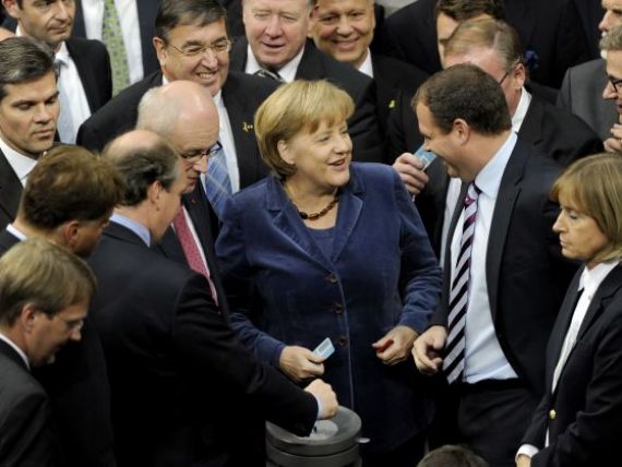 Merkel vrea un acord UE asupra reducerii cu 50% a datoriilor Greciei catre creditorii privati
