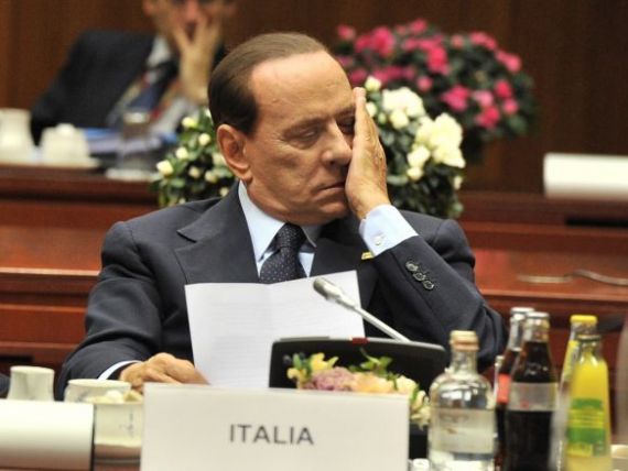 Somn si politica: Italia este pe marginea prapastiei, iar Berlusconi tine cu dintii de putere. Cum a adormit, de doua ori, premierul la summit-ul de la Cannes