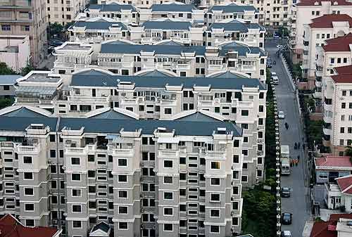 Culmea crizei la chinezi: cine cumpara un apartament primeste un BMW gratis