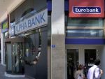 Actionarii Eurobank si Alpha Bank au aprobat fuziunea celor doua banci