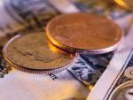 Suprematia euro si a dolarului, amenintata. O moneda puternica se ridica in Asia