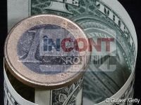 
	Euro a atins minimul ultimelor 21 de luni fata de dolar inaintea summitului liderilor UE
