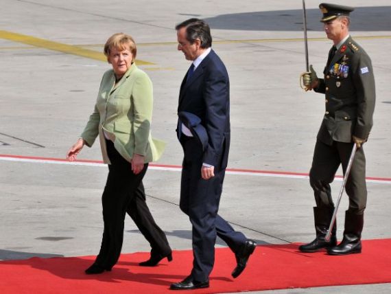 Angela Merkel a ajuns in Grecia pentru prima data de la inceputul crizei: Statul elen a facut progrese. Vreau sa ramana in zona euro . Violente la Atena