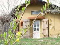 
	O casa din Romania, in top 10 cele mai reusite locuinte &quot;cob&quot; din lume
