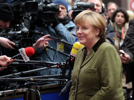 Merkel da Germania de Est exemplu tarilor europene cu probleme economice
