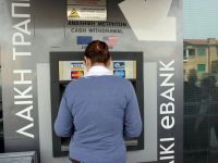 
	Liderii UE iau in calcul inchiderea a doua dintre cele mai mari banci cipriote, prezente si in Romania. Ce se intampla cu banii clientilor
