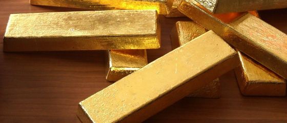 Cel mai mare producator de aur, pierderi de 8,6 mld. dolari in trim II. Se pregateste sa inchida sau sa vanda mine