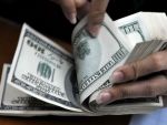 Bancnota de 100 de dolari isi schimba infatisarea