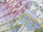 Leul s-a apreciat usor in raport cu moneda europeana si dolarul. Cursul anuntat de BNR a scazut cu 0,5 bani, la 4,4283 lei/euro