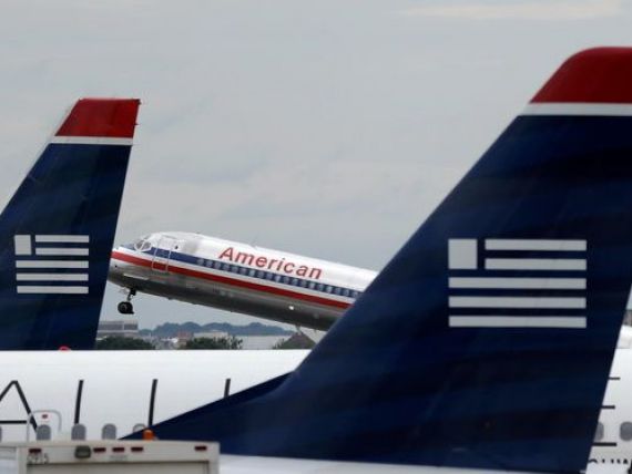 Fuziunea dintre American Airlines si US Airways, care ar fi creat cel mai mare operator aerian din lume, blocata de justitia americana