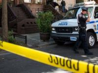 O femeie si patru copii, injunghiati mortal intr-un bloc de locuinte din New York