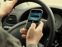 Marea Britanie ar putea interzice soferilor vorbitul la telefon atunci cand sunt la volan
