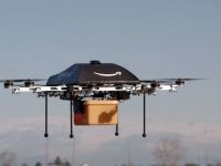 
	Amazon vrea sa livreze produse cu ajutorul dronelor. Autoritatile americane contesta proiectul
