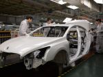 Profitul Peugeot pe 2013, impact negativ de 1,1 mld. euro