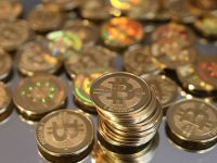 
	Seful autoritatii financiare din statul New York vrea reglementarea monedei virtuale bitcoin
