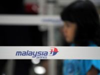 
	Ancheta pentru trafic de pasapoarte in Thailanda, dupa disparitiei avionului Malaysia Airlines. Un oficial neaga ca ar fi fost descoperite resturi ale aeronavei
