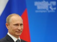 
	Popularitatea lui Vladimir Putin a ajuns la un nivel-record in Rusia, in contextul anexarii Crimeei
