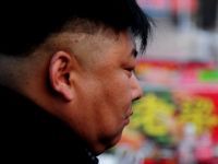 Barbatii din Coreea de Nord au primit ordinul de a adopta tunsoarea lui Kim Jong-un