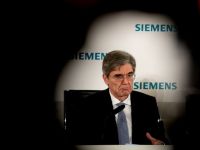 
	Seful Siemens, mustrat de Merkel pentru vizita la Moscova
