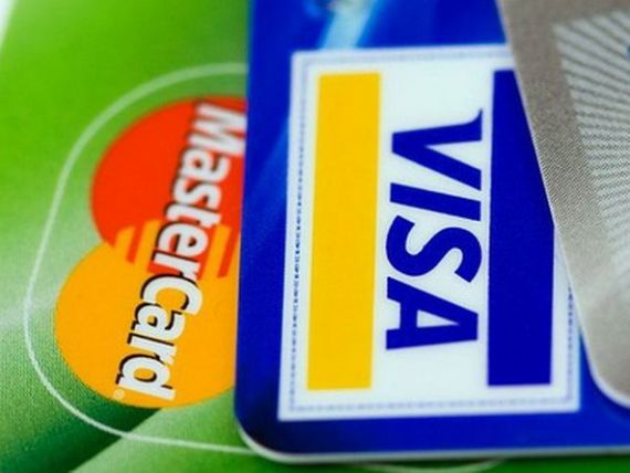 Medvedev ameninta ca va pedepsi Visa si MasterCard pentru participarea la sanctiunile impuse de SUA. Rusia vrea sa-si faca propriul sistem de plati electronice