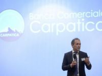 Conducerea Carpatica vrea sa reia discutiile cu Nextebank pentru fuziune si propune o reducere a capitalului. Actiunile bancii se prabusesc cu 15% la BVB