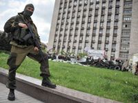 Republica autoproclamata Donetk a inceput sa-si formeze o armata, cu armamentul preluat de la politie