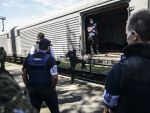 Trenul care transporta cadavrele victimelor zborului MH17 a ajuns la Harkov