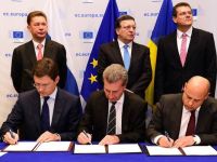 
	Europa va avea gaze la iarna. Rusia, Ucraina si UE au semnat un acord privind reluarea livrarilor de catre Gazprom, valabil pana in martie 2015
