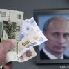 Efectele prabusirii rublei au inceput sa fie simtite de populatie. Rusii ii cer, in strada, presedintelui Putin sa intervina pentru redresarea monedei