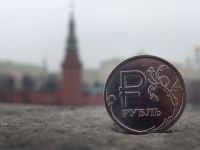 
	Rubla a coborat luni sub pragul istoric de 60 de unitati pentru un dolar&nbsp;
