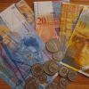 ANPC cere bancilor sa taie 25% din datoriile celor cu credite in franci. Protestele rata in monede starnesc primele reactii