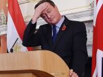 Premierul britanic, presat sa demisioneze, dupa ce a recunoscut ca a detinut actiuni intr-o companie din Panama