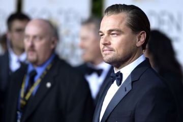 Davos: Leonardo DiCaprio, premiat. Richard Quest, interpret de iodlere
