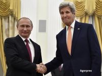 Replici ironice intre Putin si Kerry. Misterul gentii pe care secretarul de stat american a purtat-o tot timpul la Moscova