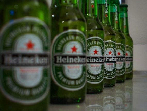Heineken dă lovitura pe cea mai mare piață din lume. Olandezii preiau o participație la CRH Beer, cel mai mare producător din China