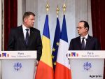 Transportatorii ii cer lui Klaus Iohannis sa abordeze, cu presedintele François Hollande, problema salariului minim in Franta. Cum ii afecteaza legislatia franceza