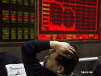 
	Unde de șoc pe piețele financiare. Bursele din Asia și Europa scad ca urmare a prăbușirii bursei de la New York. Teodorovici: Scăderea burselor nu ne afectează. Investitorii au încredere în România
